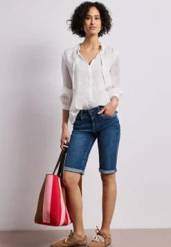 Bermuda en denim à coupe slim et finitions à revers