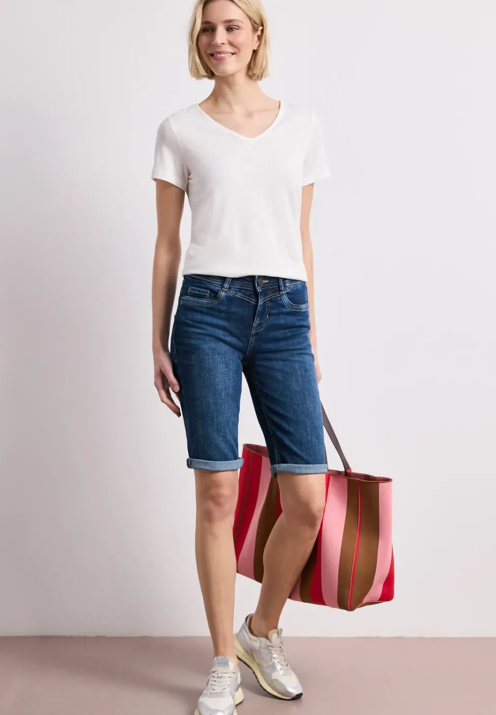 Bermuda en denim slim fit à revers