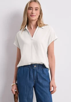 Blouse à col chemise et ourlet élastiqué
