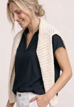 Blouse à col chemise et ourlet élastiqué