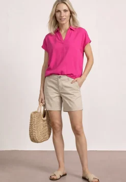 Blouse à col chemise et ourlet élastiqué