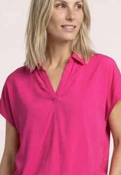 Blouse à col chemise et ourlet élastiqué