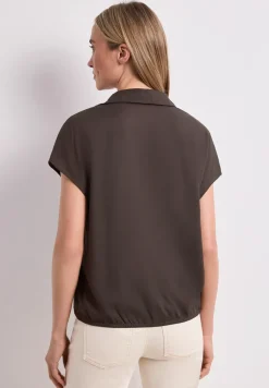 Blouse à col chemise et ourlet élastiqué