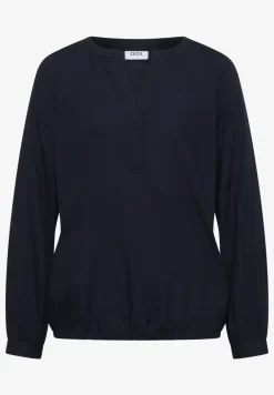 Blouse à col fendu