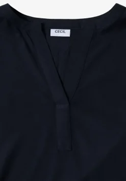 Blouse à col fendu
