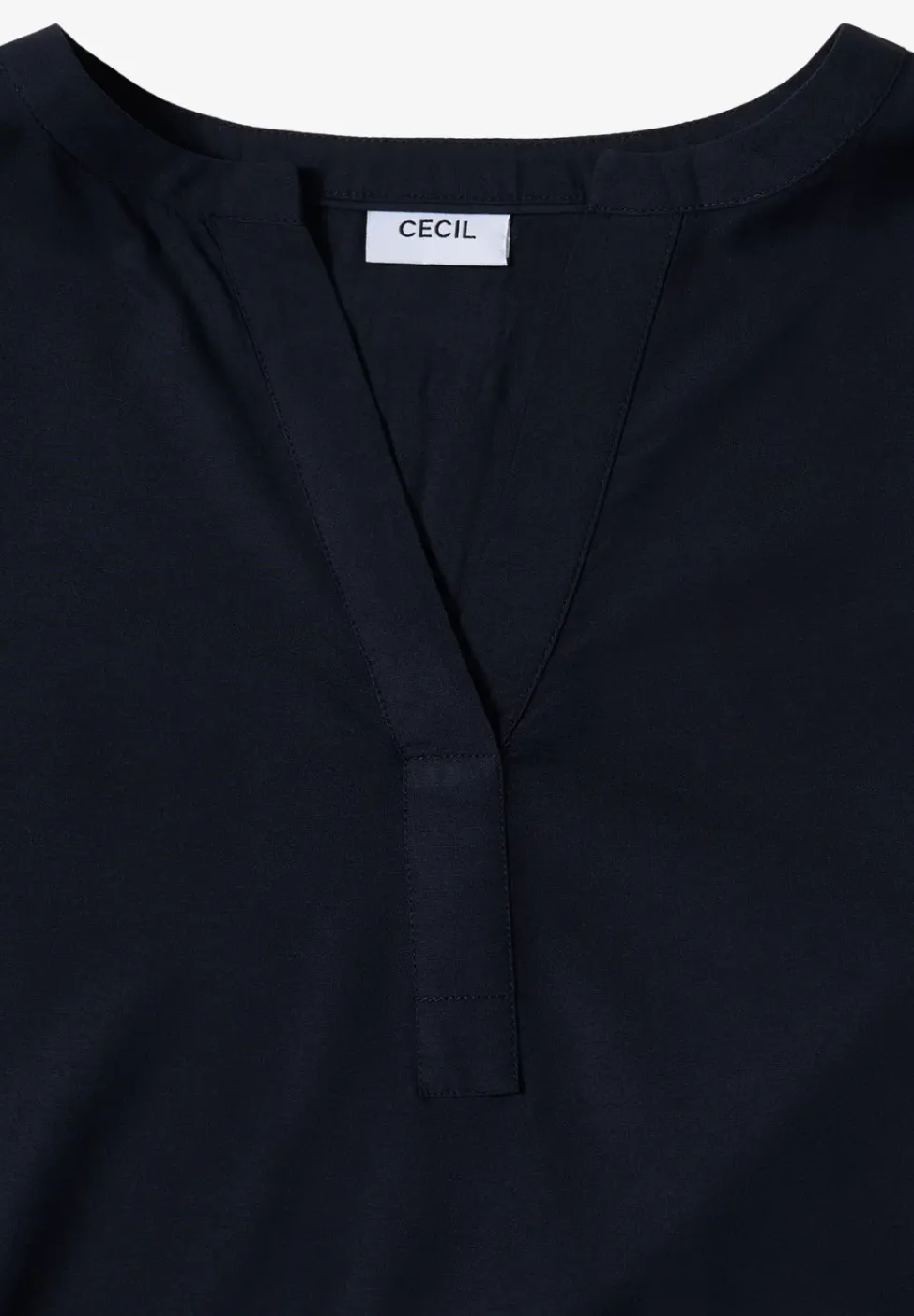 Blouse à col fendu