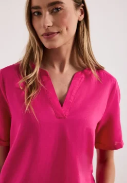 Blouse à col fendu en lin mélangé