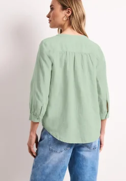 Blouse à col fendu en lin mélangé