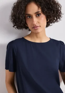 Blouse à col rond et manches courtes bouffantes