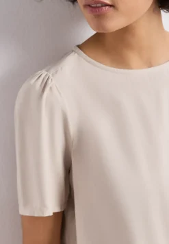 Blouse à col rond et manches courtes bouffantes