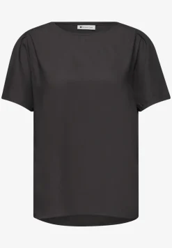 Blouse à col rond et manches courtes bouffantes