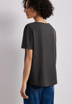 Blouse à col rond et manches courtes bouffantes