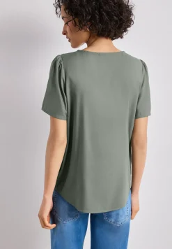 Blouse à col rond et manches courtes bouffantes