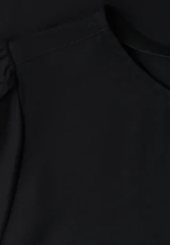 Blouse à col rond et manches courtes bouffantes