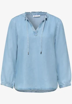 Blouse à manches 3/4 avec col fendu dans un look denim