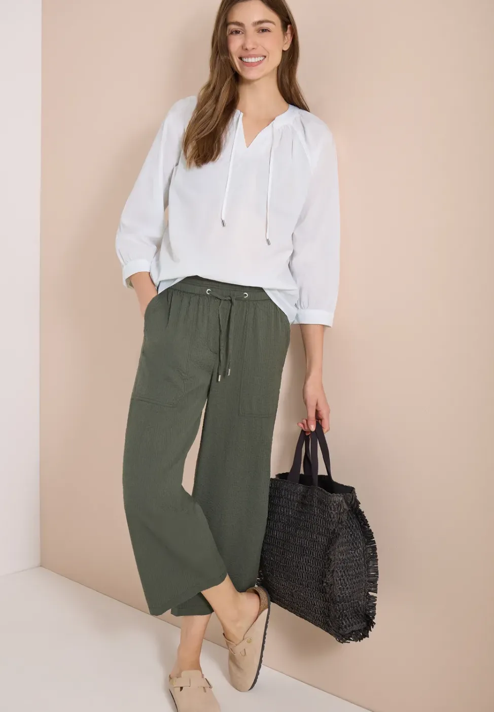 Blouse à manches 3/4 avec col fendu en couleur unie