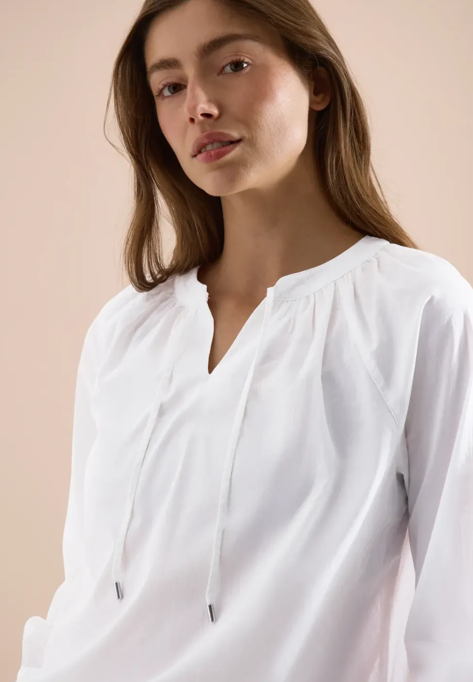 Blouse à manches 3/4 avec col fendu en couleur unie
