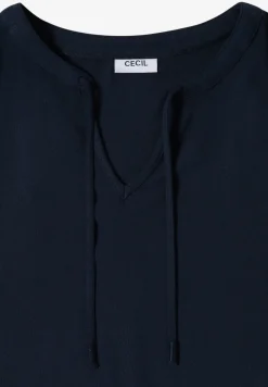 Blouse à manches courtes avec mélange de structures