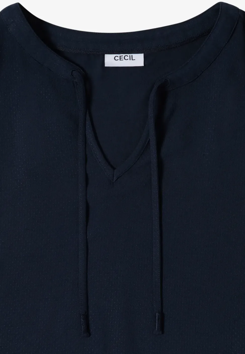 Blouse à manches courtes avec mélange de structures
