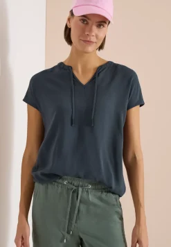 Blouse à manches courtes avec mélange de structures