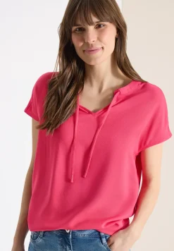 Blouse à manches courtes avec mélange de structures