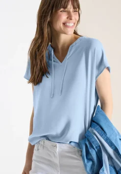 Blouse à manches courtes avec mélange de structures