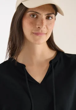 Blouse à manches courtes avec mélange de structures
