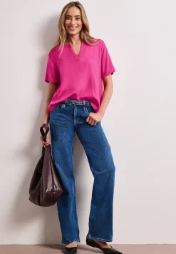 Blouse à manches courtes avec col fendu en couleur unie
