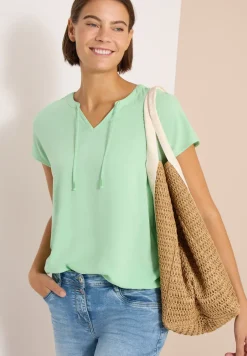 Blouse à manches courtes avec mélange de structures