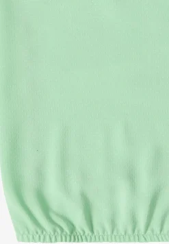Blouse à manches courtes avec mélange de structures