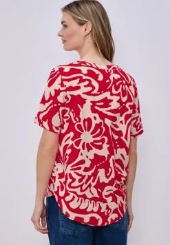 Blouse à manches courtes avec motif floral