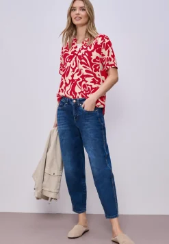 Blouse à manches courtes avec motif floral
