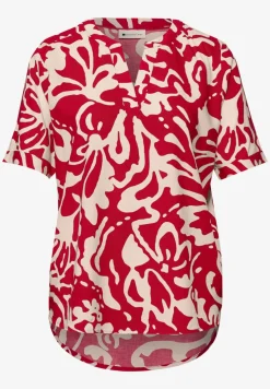 Blouse à manches courtes avec motif floral