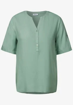 Blouse à manches courtes en couleur unie