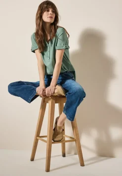 Blouse à manches courtes en couleur unie