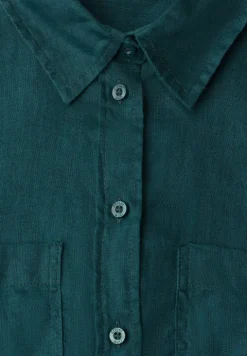 Blouse à manches longues avec poches sur la poitrine
