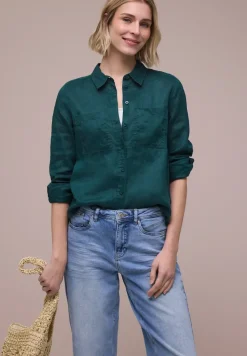 Blouse à manches longues avec poches sur la poitrine
