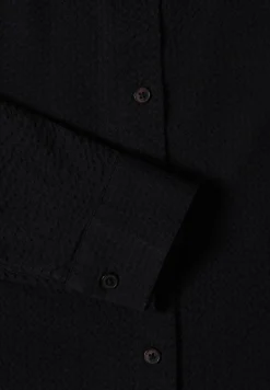 Blouse à manches longues avec structure et boutons