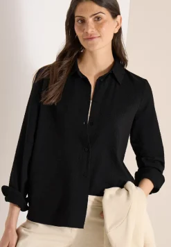 Blouse à manches longues avec structure et boutons