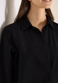 Blouse à manches longues avec structure et boutons