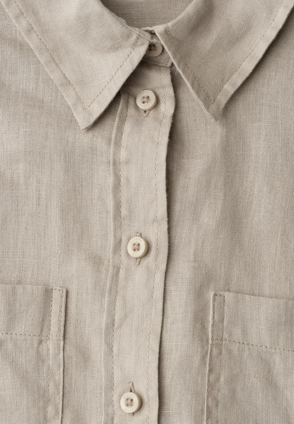 Blouse à manches longues avec poches sur la poitrine