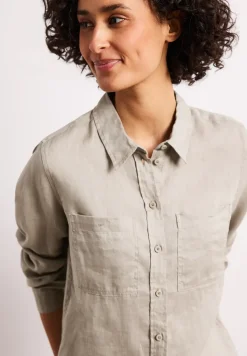 Blouse à manches longues avec poches sur la poitrine