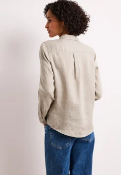 Blouse à manches longues avec poches sur la poitrine