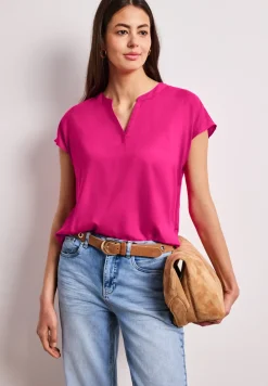 Blouse à épaules tombantes avec col fendu