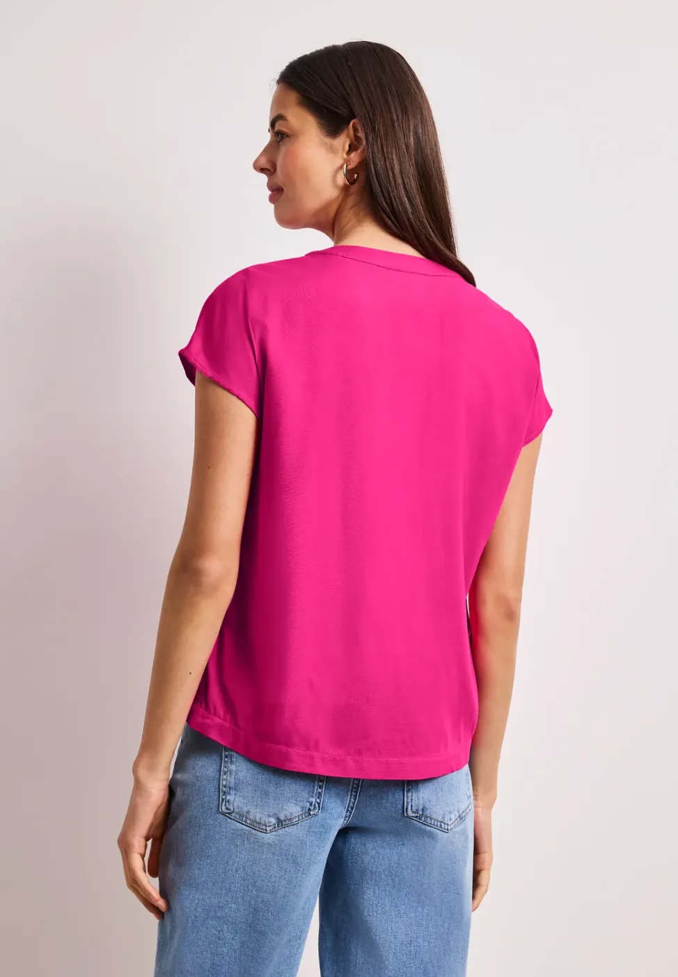 Blouse à épaules tombantes avec col fendu