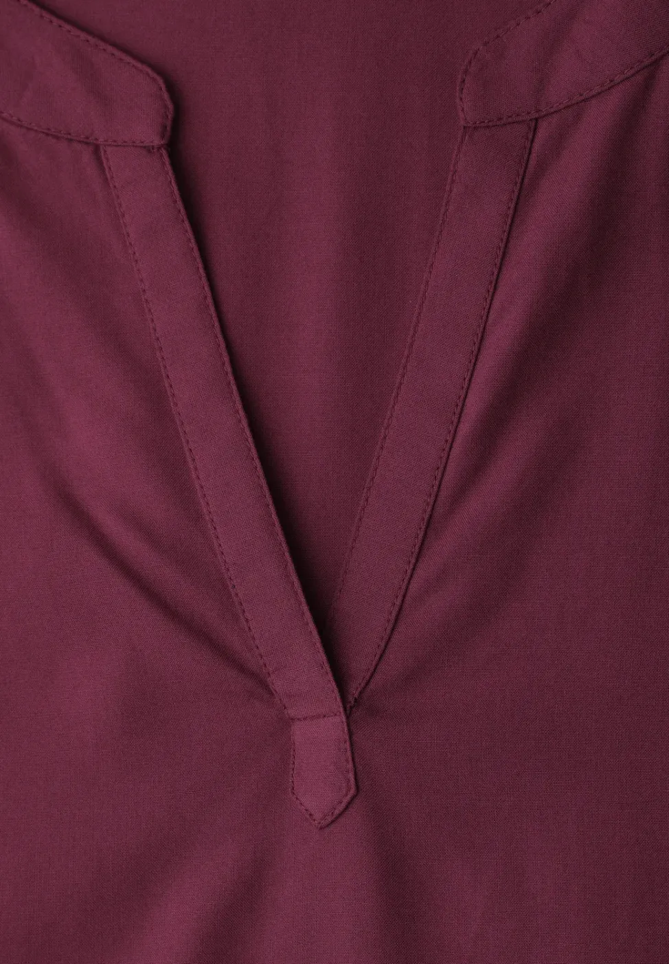 Blouse à épaules tombantes avec col fendu