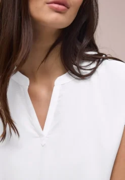 Blouse à épaules tombantes avec col fendu