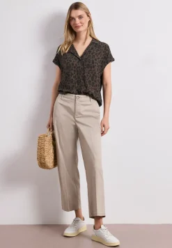 Blouse à épaules tombantes avec col bowling