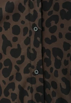 Blouse à épaules tombantes avec col bowling