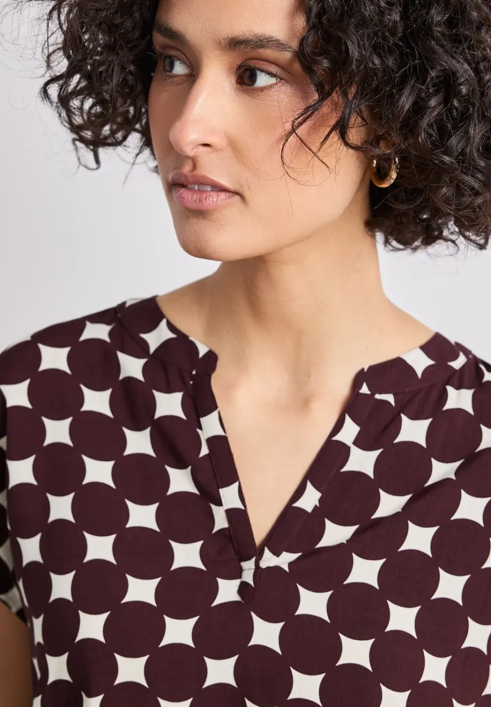 Blouse à épaules tombantes avec col fendu